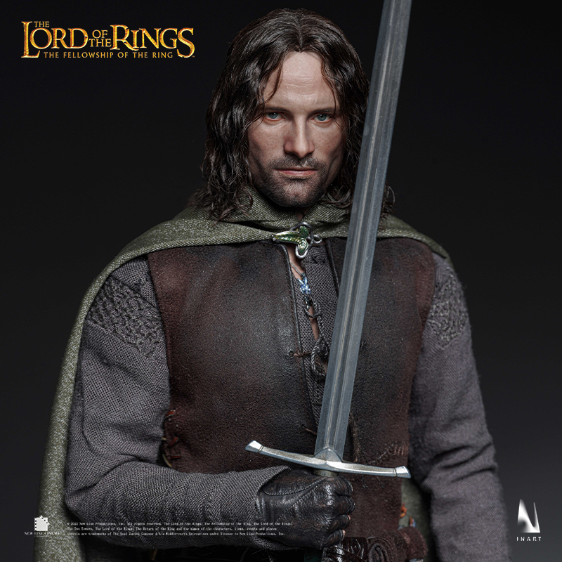 Miniature Aragorn figure, capturing his heroic stance.