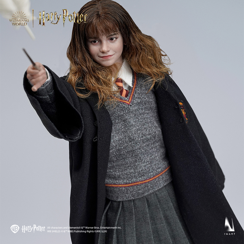 Miniature Hermione Granger in a studious pose