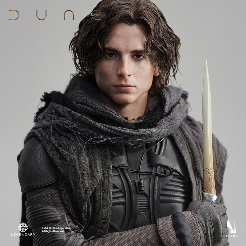 Paul Atreides figure with intricate sci-fi costume elements