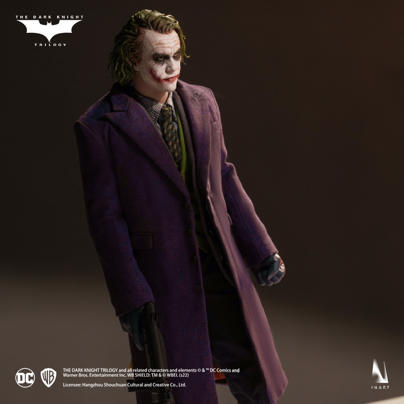 Collectible figure depicting The Joker's iconic appearance from The Dark Knight