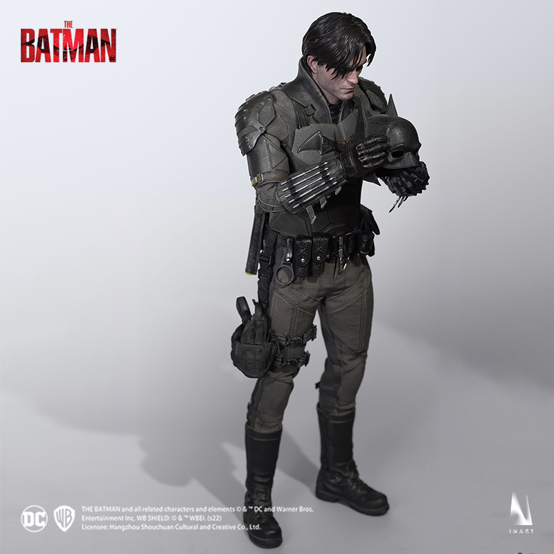 The Batman figure in a dynamic and ready-for-action pose