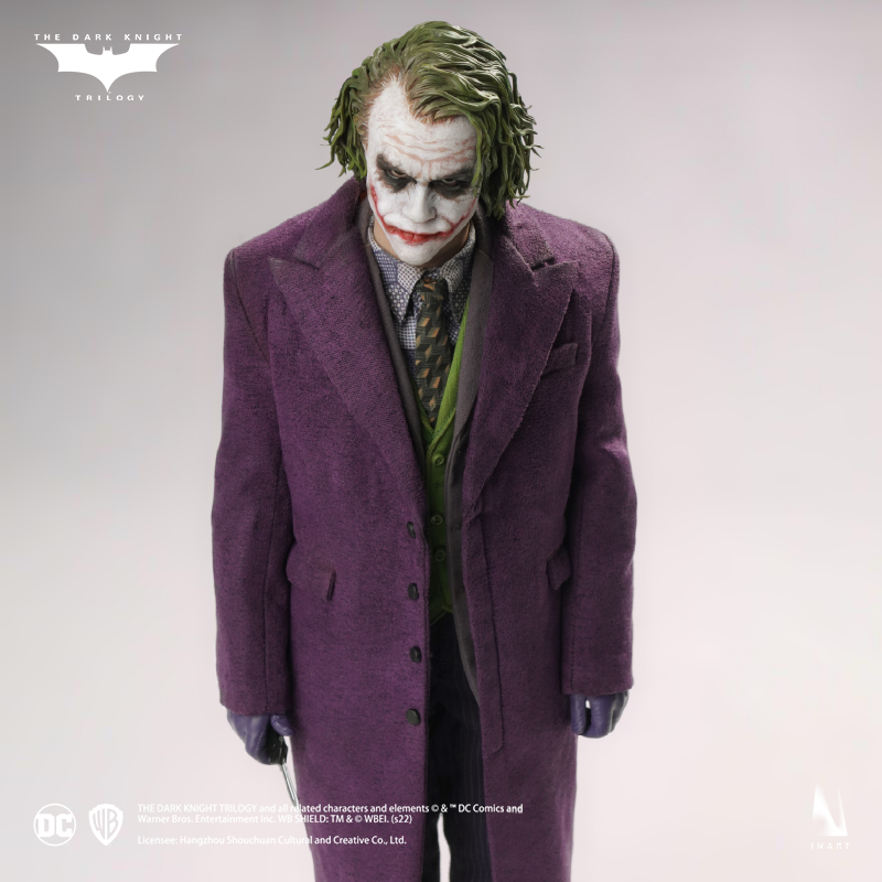 The Dark Knight Joker figure in a menacing and theatrical pose