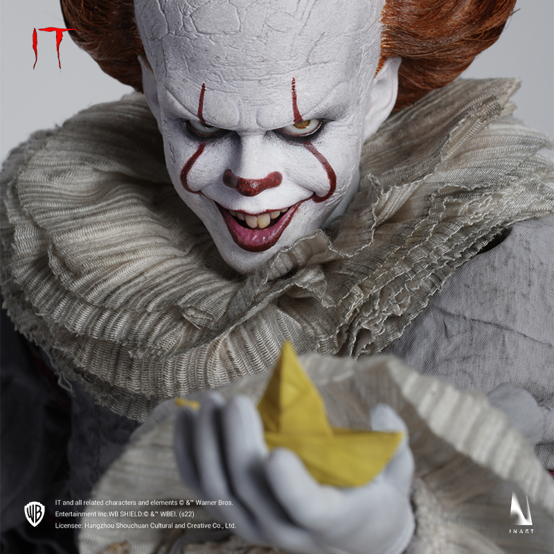 Pennywise figure with authentic costume and eerie expression