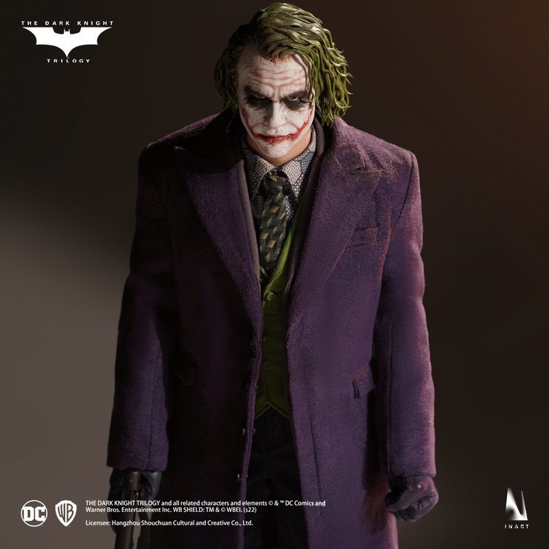 The Joker figure with authentic costume and maniacal expression